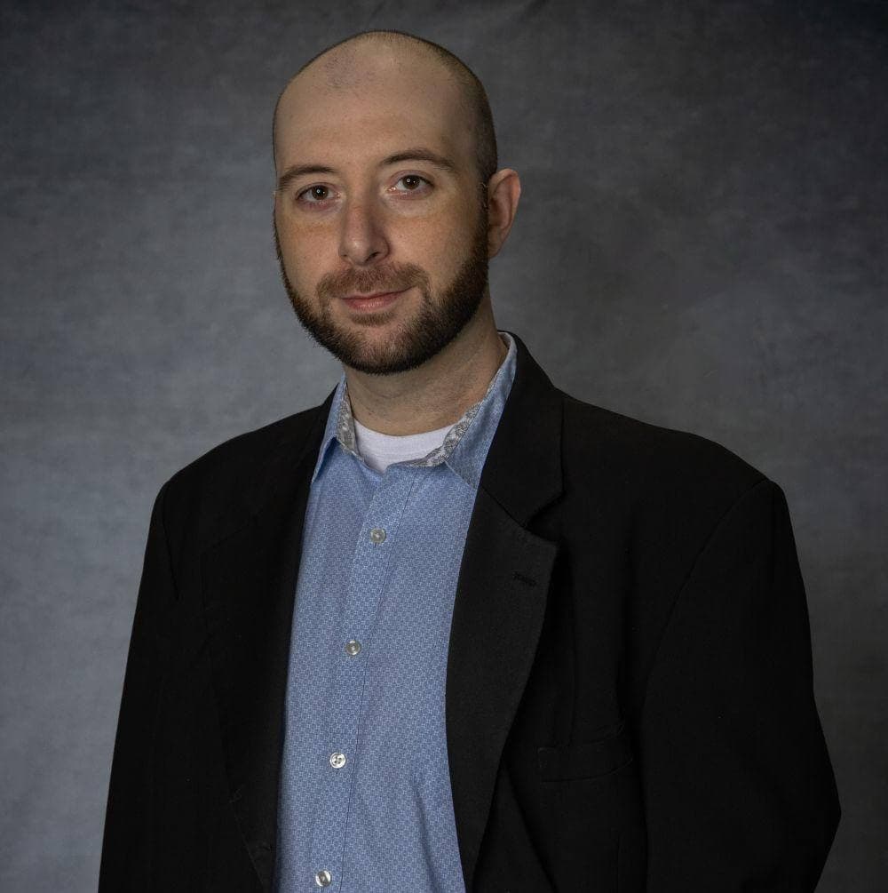 headshot of the founder of EconChangers